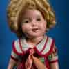 Shirley Temple 13 inch composition doll wearing Bright Eyes outfit